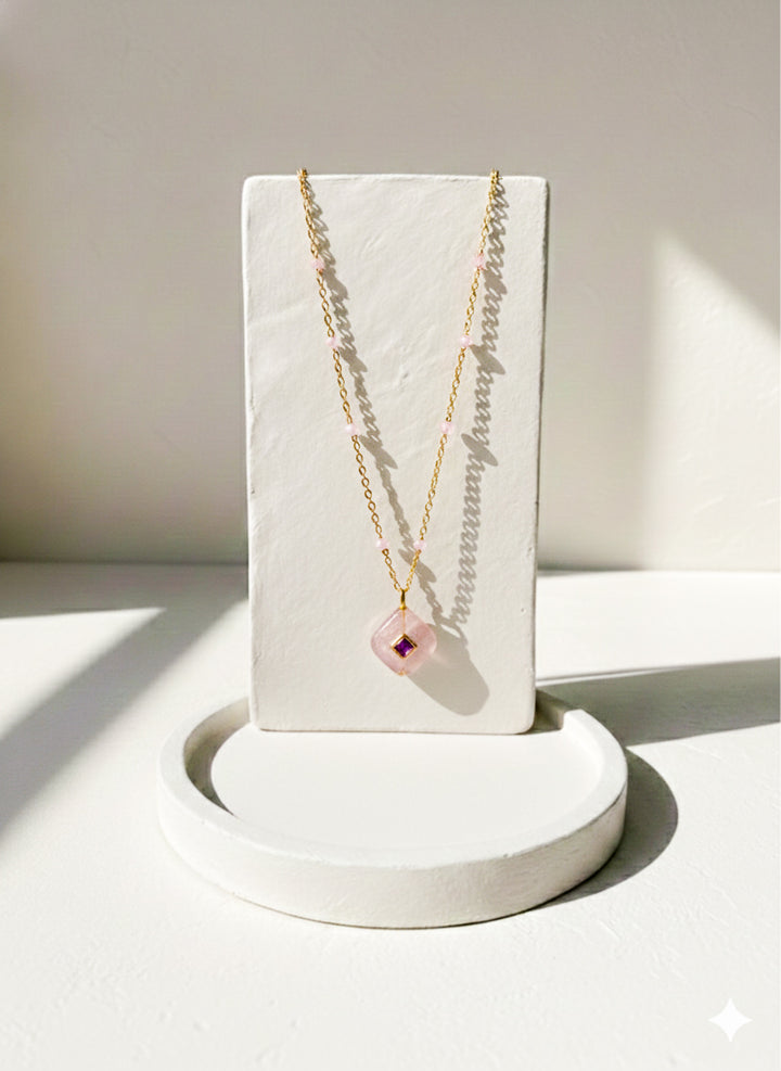 Ruby and rose quartz pendant necklace on a 14k gold-plated sterling chain, front view