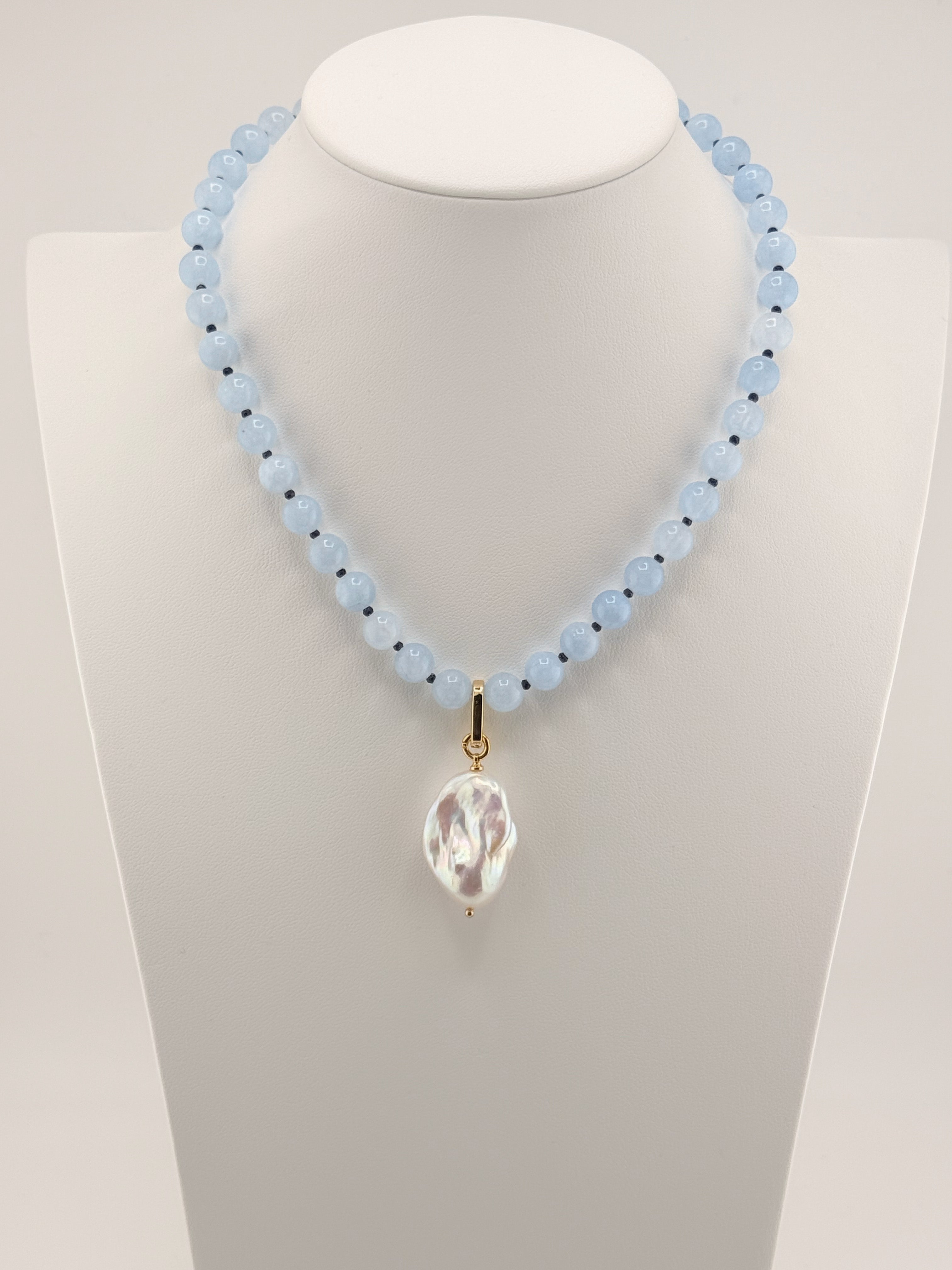 Aquamarine and blue jade layering necklace with a baroque pearl drop and 18k gold-plated accents, front view