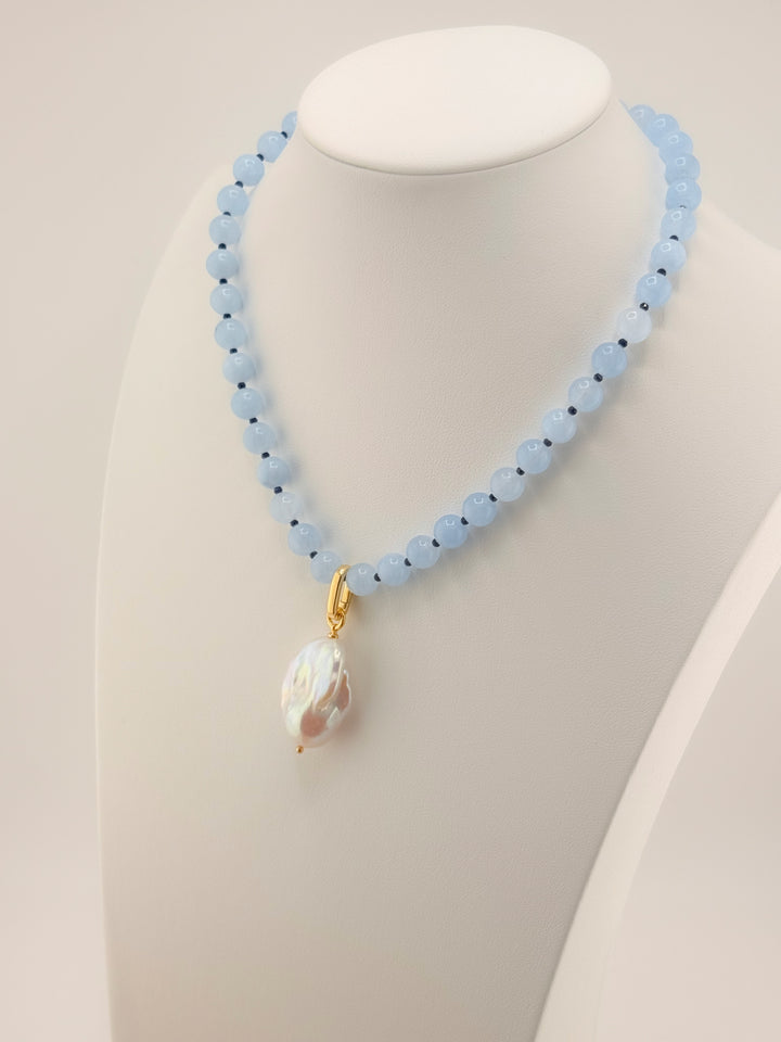 Aquamarine and blue jade necklace with a baroque pearl drop, right-side view
