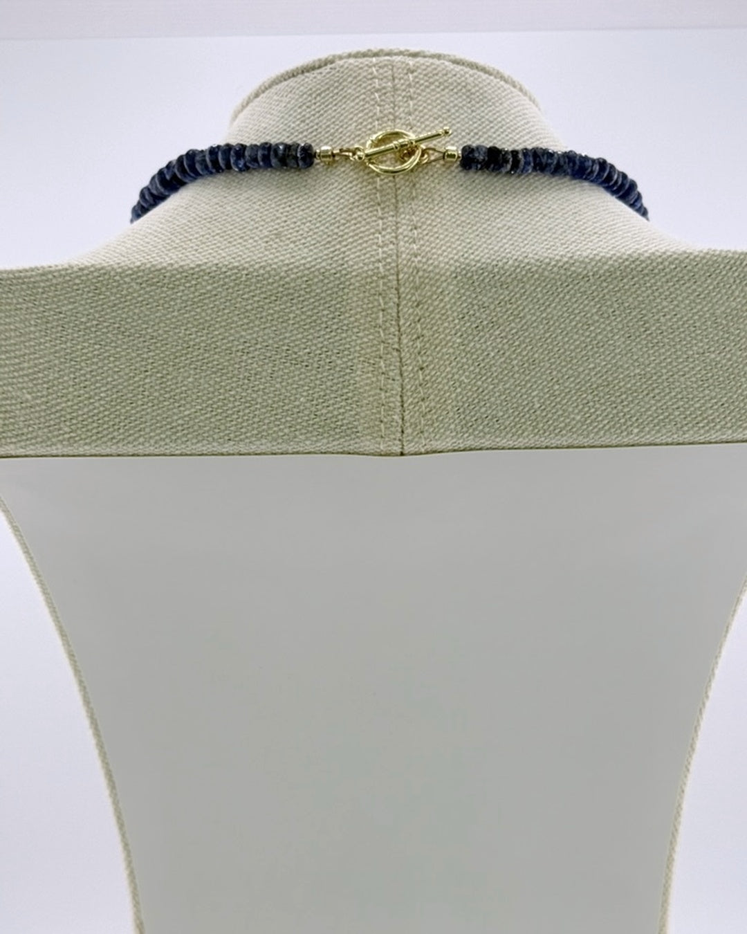 Back view showing the 18k gold-plated toggle clasp on the kyanite necklace