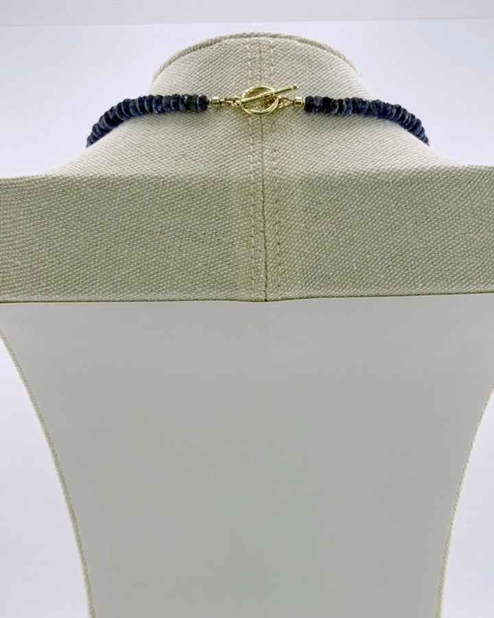 Back view showing the 18k gold-plated toggle clasp on the kyanite necklace