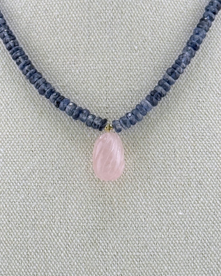 Close-up macro of the translucent faceted navy kyanite beads