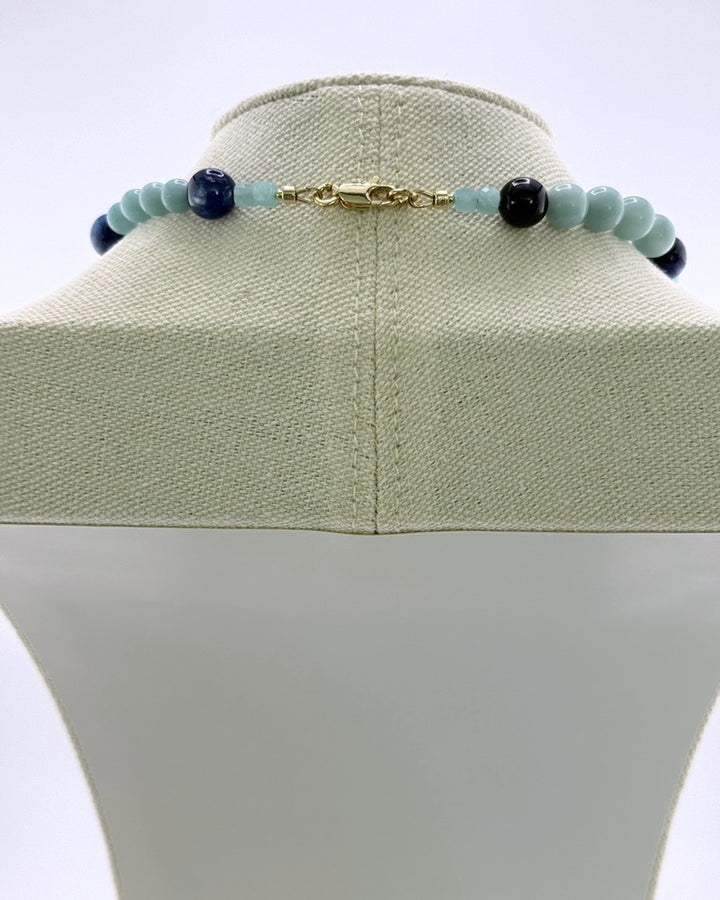 Gold clasp on the kyanite and amazonite beaded necklace