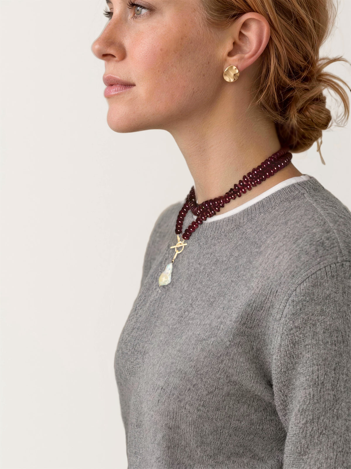 Lulu Necklace in Burgundy, Long, worn doubled, shown in profile