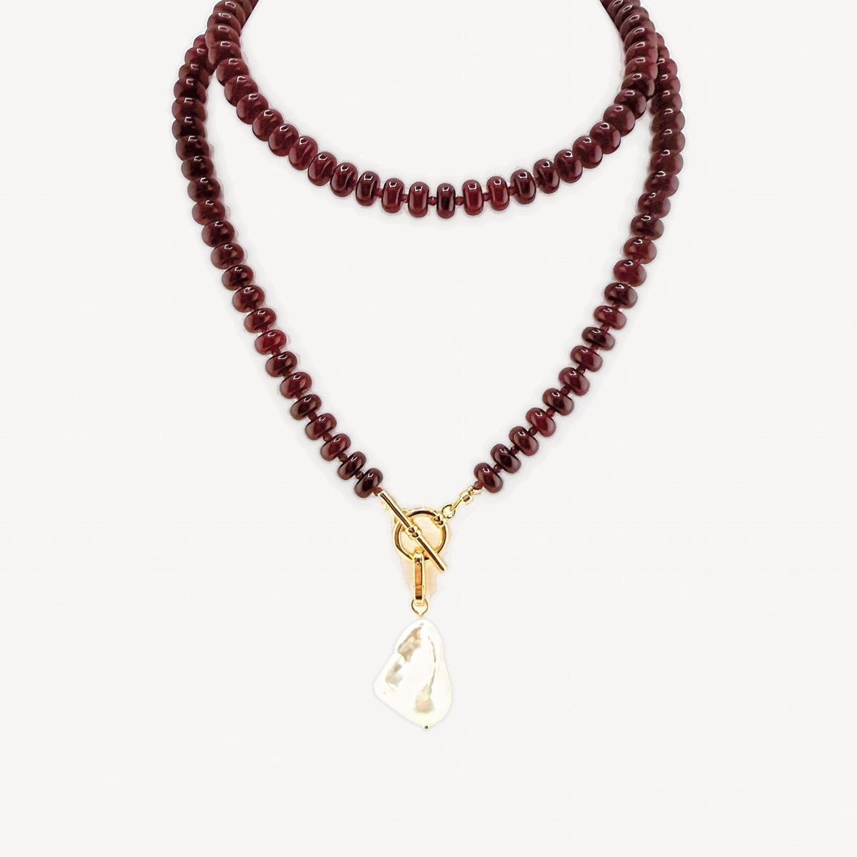 Lulu Necklace in Burgundy, Long, with the toggle at the front and the cultured baroque pearl charm