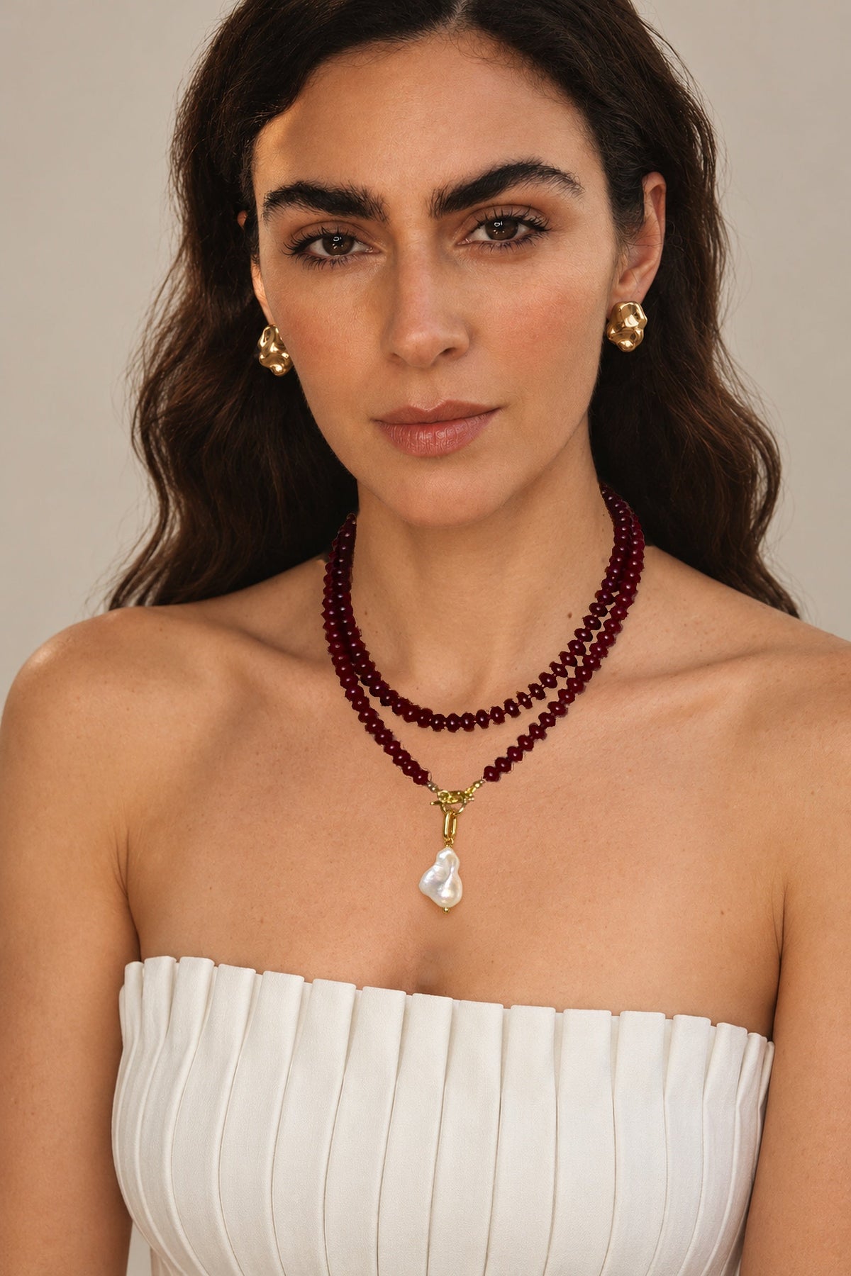 Cultured baroque pearl charm worn on the Lulu Necklace in Burgundy