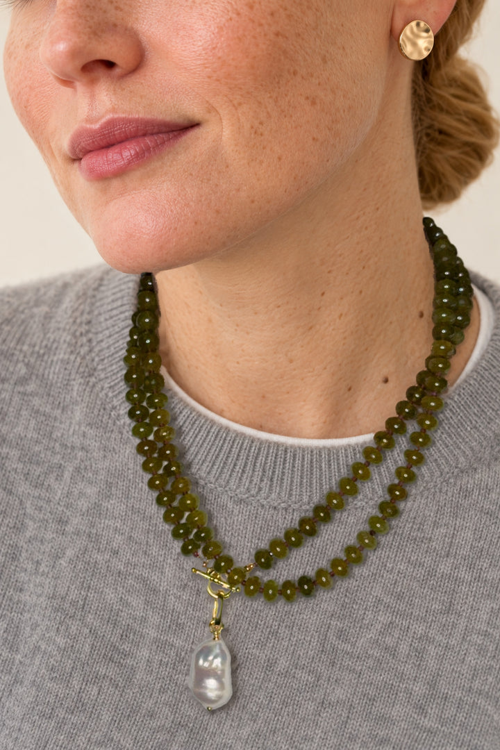 Lulu Necklace in Olive worn doubled, model with head turned