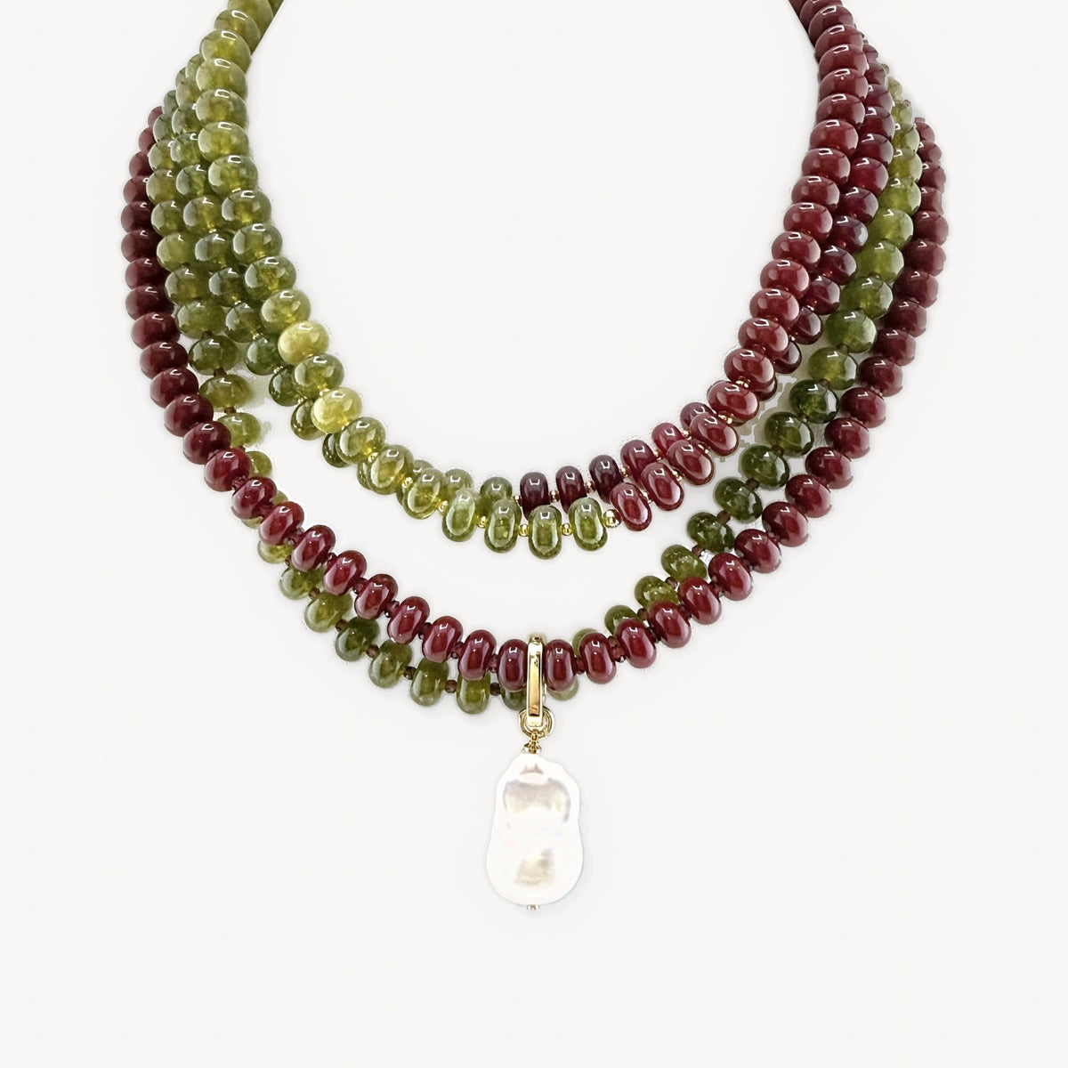 Lulu necklaces in burgundy and olive layered together with a cultured baroque pearl charm