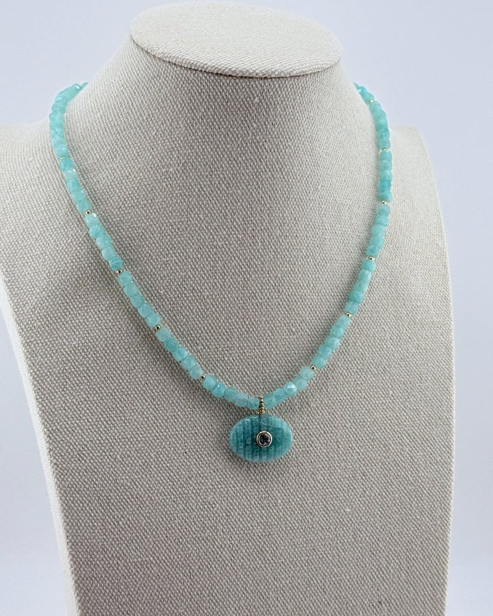 Small amazonite pendant necklace, angled view on the display bust